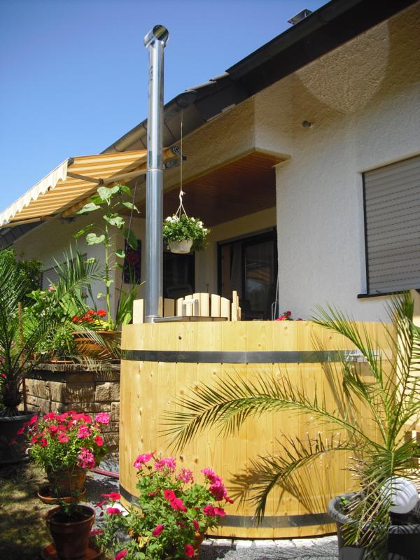 Észt Lucfenyő dézsa beépített kályhával